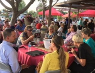 residents seated at tables for the Dobson Ranch  2019 Annual Meeting of the Members event