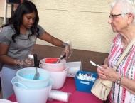 Ave Wright hands our Italian ice at the Dobson Ranch  2019 Annual Meeting of the Members event