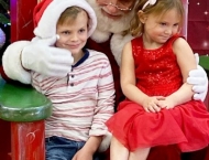 Ernst boy and girl with Santa at Dobson Ranch 2019 Breakfast with Santa event