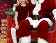 santa with girl in red velvet at Dobson Ranch 2019 Breakfast with Santa event
