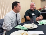 two men chat at Dobson Ranch 2020 Breakfast with the City event