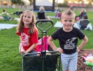 young girl and boy with wagon at Dobson Ranch 2020 Movie in the Park event