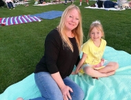 mother and daughter sitting on blanket at Dobson Ranch 2020 Movie in the Park event