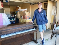Man selling his piano at garage sale at Dobson Ranch 2020 Spring Community Clean Up event