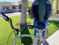 Man selling bike at Dobson Ranch 2020 Spring Community Clean Up event