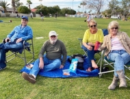 residents relax in lawn chairs  at Dobson Ranch 2020 Sunday in the Park event