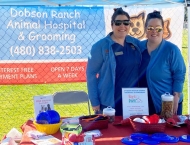 two women from Dobson Ranch Animal Hospital booth at Dobson Ranch 2020 Winter Bark in the Park event