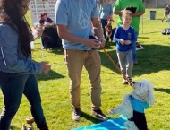 residents showing off their dog tricks at Dobson Ranch 2020 Winter Bark in the Park event