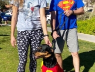 super dog and owners at Dobson Ranch 2020 Winter Bark in the Park event