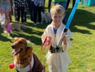 Jedi boy and his dog at Dobson Ranch 2020 Winter Bark in the Park event