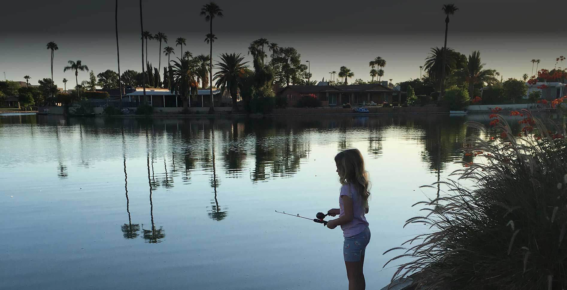 Young girl fishing at Dobson Ranch lake