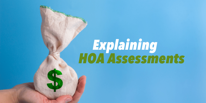 Assessments page banner with text saying, Explaining HOA Assessments" next to a hand holding a small canvas bag with a green dollar sign on it